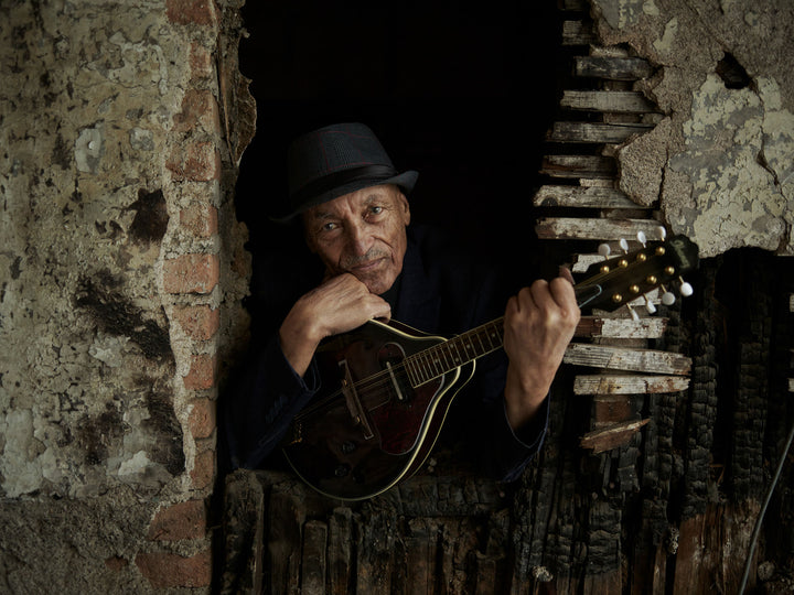 Ethiopia #33 - Musician Ato Ayalew with his mandolin