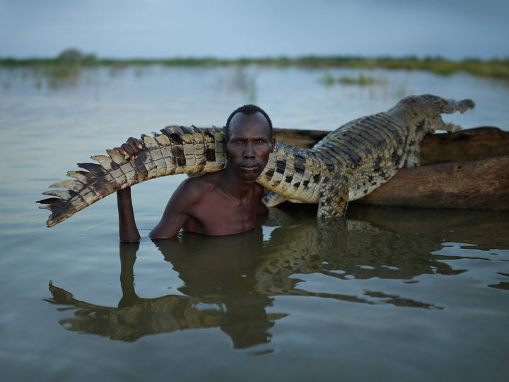 Ethiopia #44 - Mories, a subsistence hunter, with crocodile