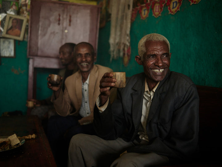 Ethiopia #51 - Abate, Sematu and Kifle drink coffee